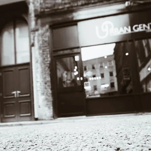 The shopfront, in black and white